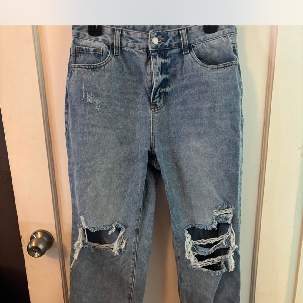 Women's Distressed Blue Jeans